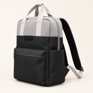 Side view of custom recycled laptop backpack showing front pocket depth and zipper construction