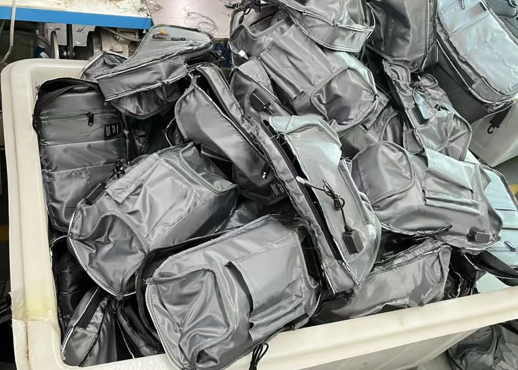 Prepared bag components arranged for consistent bulk assembly