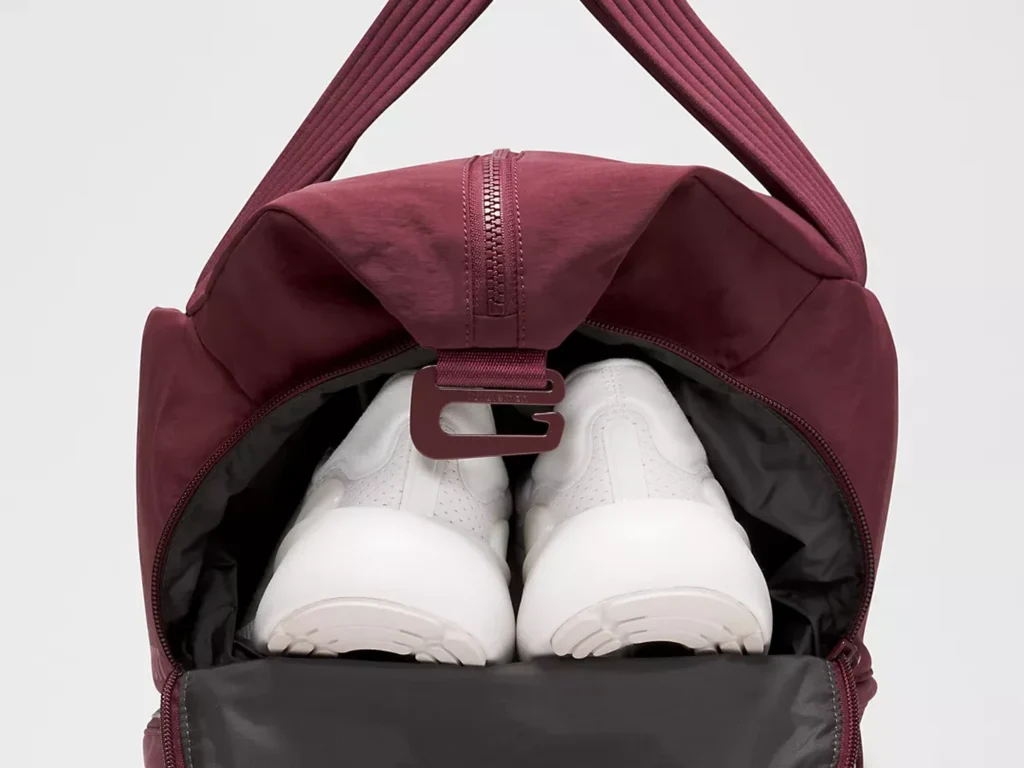 Empty and loaded duffel bag showing how packed dimensions can change
